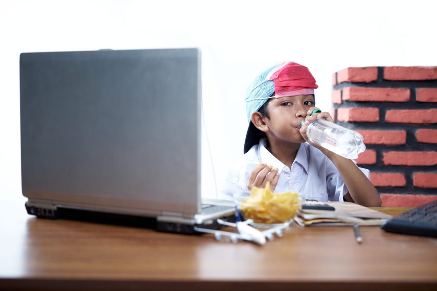 Indonesian boy studying