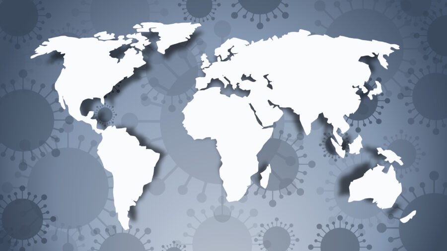 Graphic image of the a world map and the coronavirus behind it