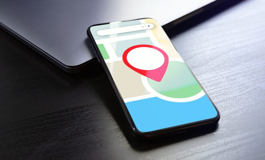 image of phone showing a map with a pin in it